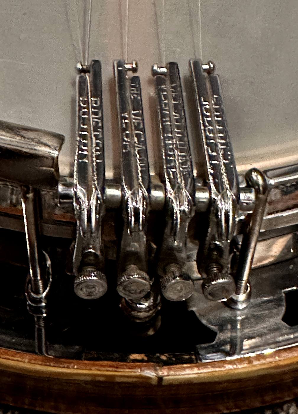 Original stamped Vega Oettinger tailpiece