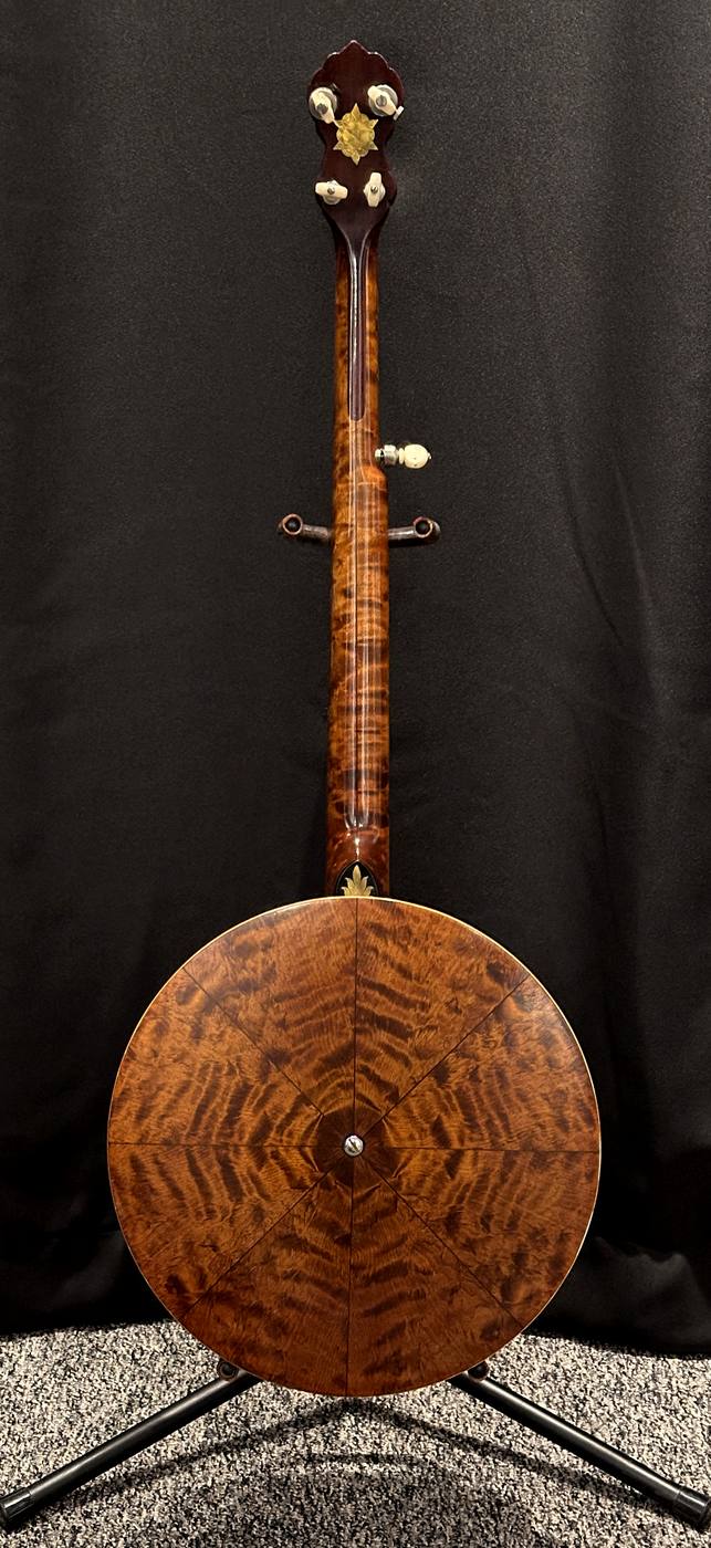Full rear view showing the birdseye/quilted maple pie-plate resonator
