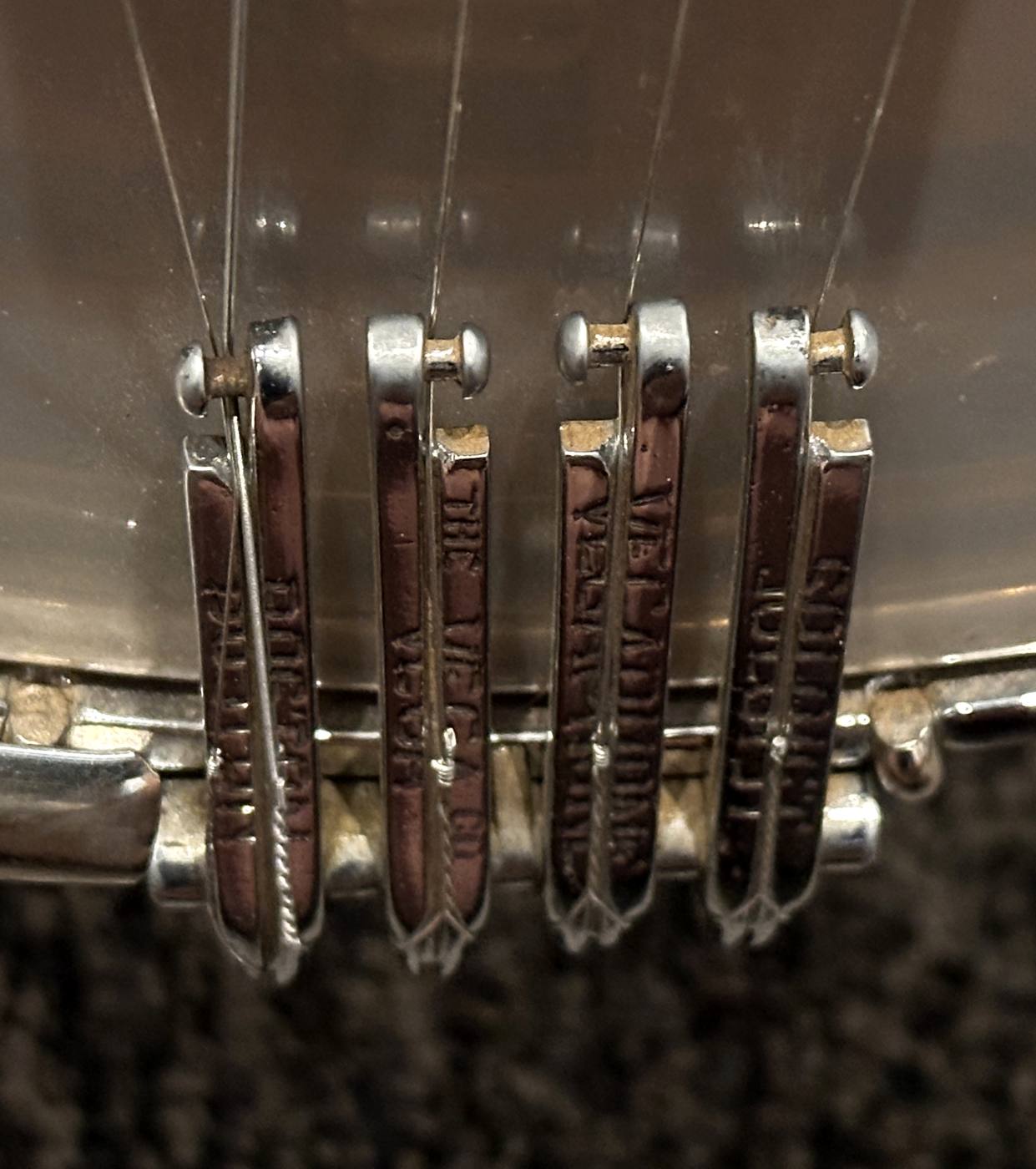 Original stamped Vega Oettinger tailpiece